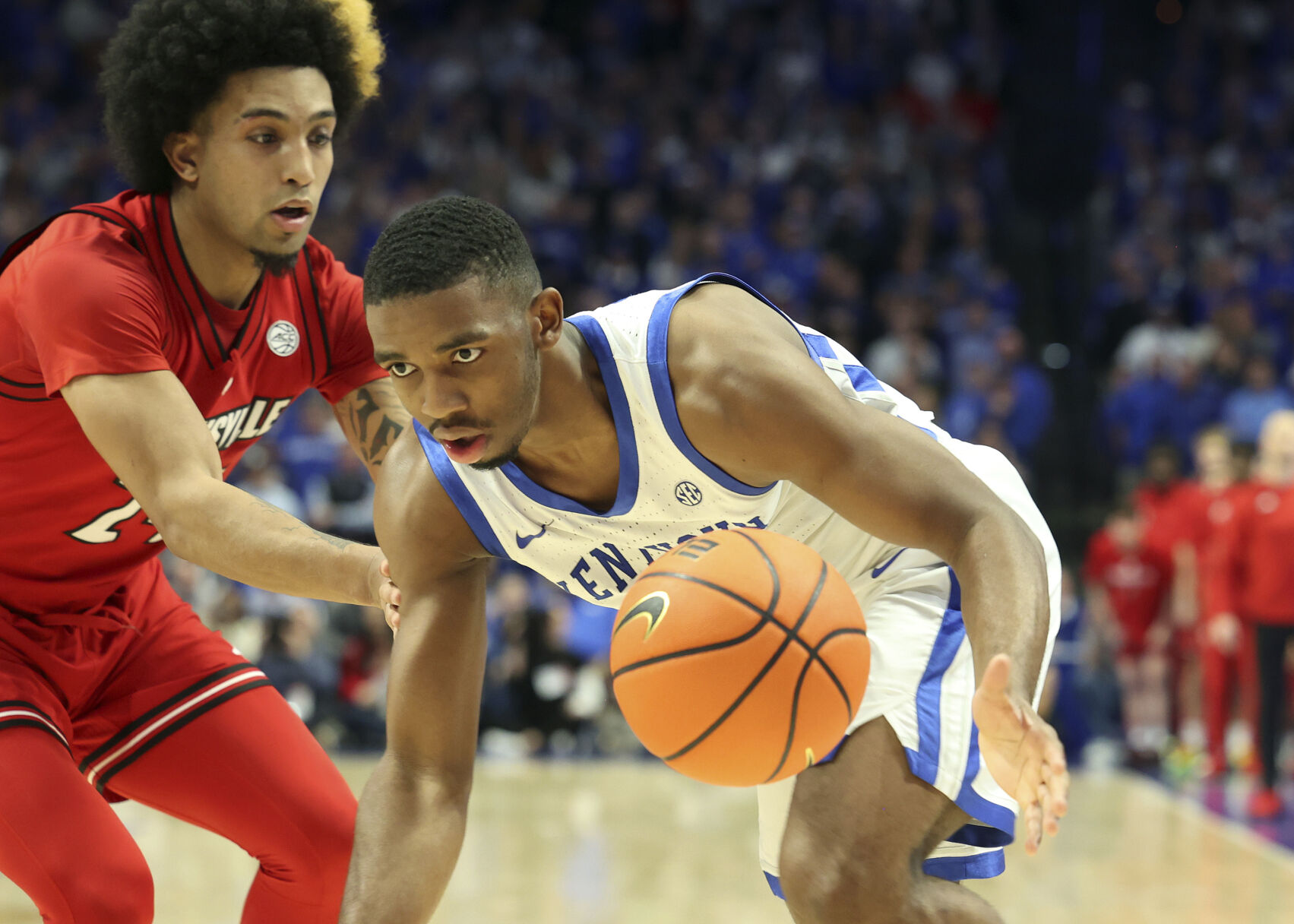 BOZICH | The Butler (33 points) does it as Kentucky beats Louisville, 93-85